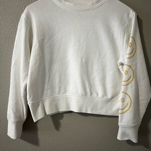 White Sweatshirt with Yellow Smiley Faces